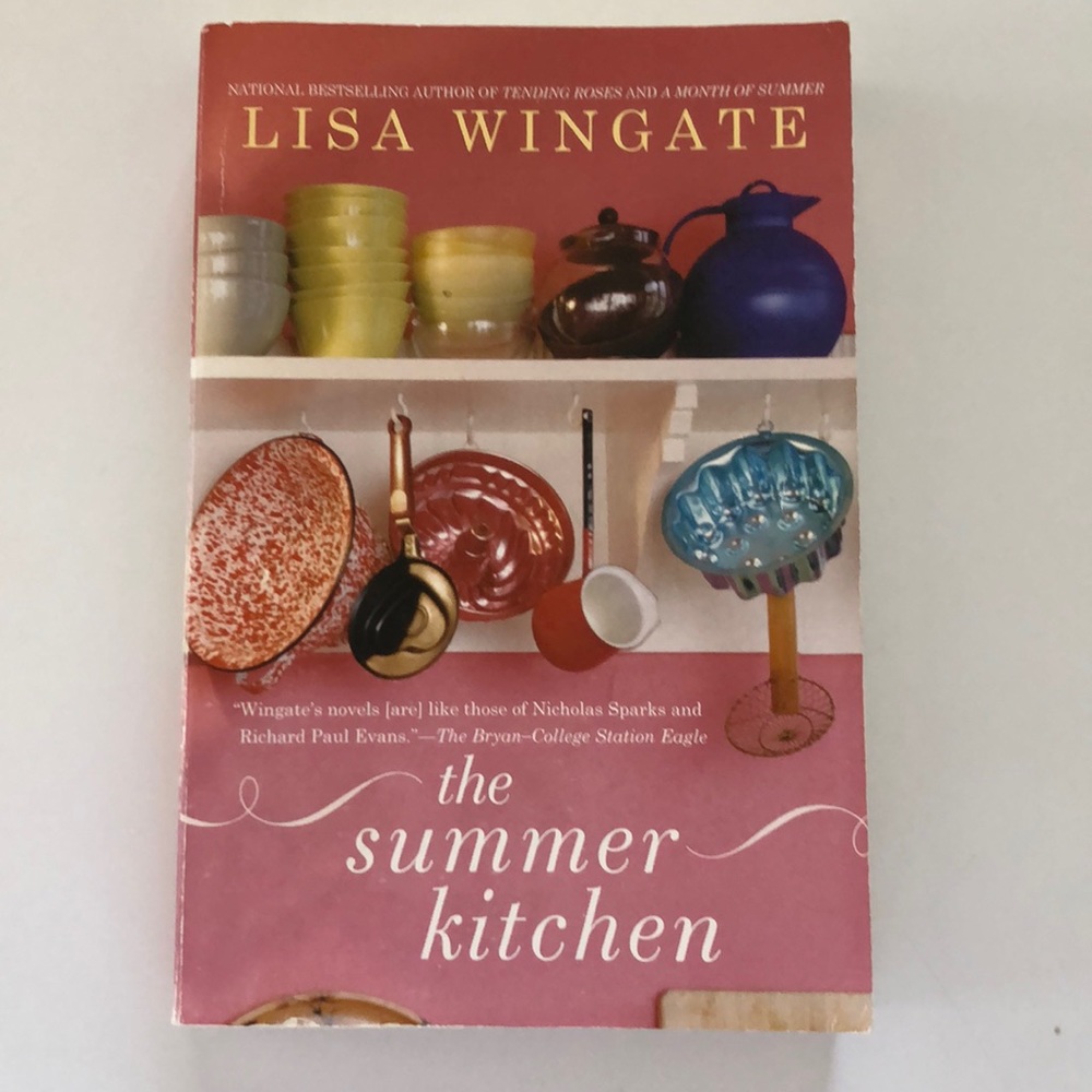 Paperback novel “the summer kitchen” by Lisa Wingate
